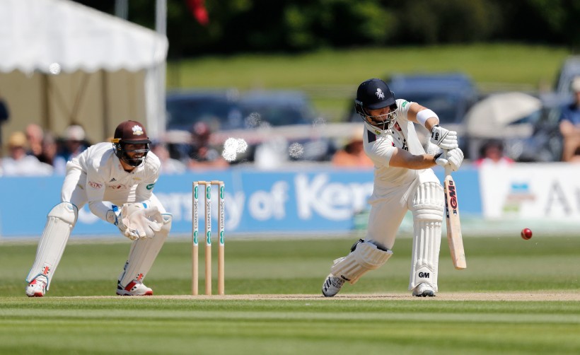 Determined display secures Surrey draw